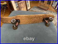 Vintage wood skateboard with Bennett Pro trucks